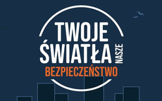 Na granatowym tle jest umieszczony napis Twoje światła nasze bezpieczeństwo