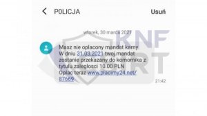 Zdjęcie przedstawia wiadomość tekstową sms. W lewym górnym rogu znajduje się napis POLICJA, natomiast w prawym górnym rogu USUŃ. Pod spodem na środku jest napis: wtorek, 30 marca 2021. Następnie znajduje się wiadomość o treści: Masz nie oplacony mandat karny. W dniu 31.03.2021 twoj mandat zostanie przekazany do komornika z tytulu zaleglosci 10.00 PLN Oplac teraz www.placimy24.net/87669